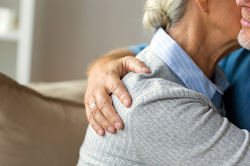 Image showing close up of married senior couple hugging