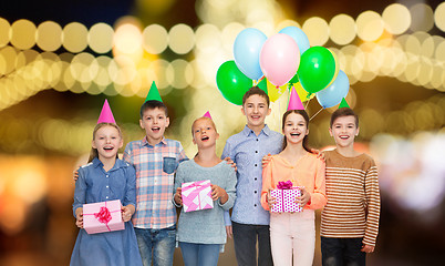 Image showing happy children with gifts at birthday party