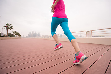 Image showing woman running on the promenade