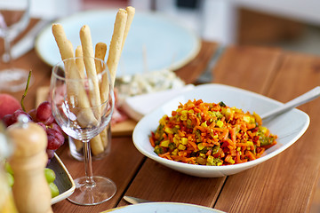 Image showing vegetable salad in bowl on wooden table