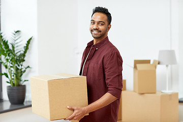 Image showing happy man with box moving to new home