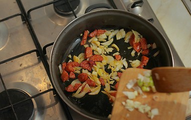 Image showing Cooking with sausages