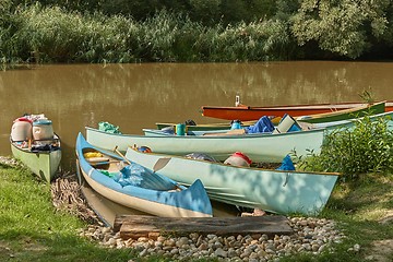 Image showing Canoes on the Riverside