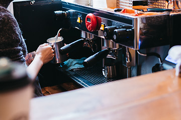 Image showing Professional coffee maker in shop