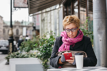 Image showing Adult woman surfing phone