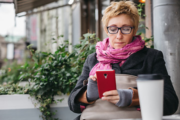 Image showing Adult woman surfing phone