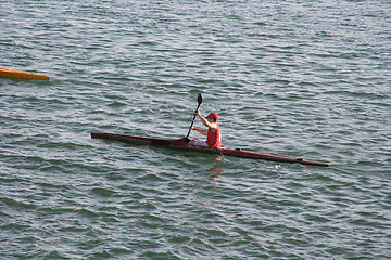 Image showing boy doing canoe