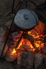 Image showing Preparing food on campfire