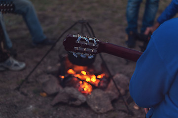 Image showing guitar near the campfire