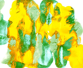 Image showing Splotches of yellow and green abstract paint 