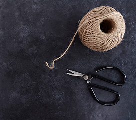 Image showing Ball of twine with traditional flower scissors 