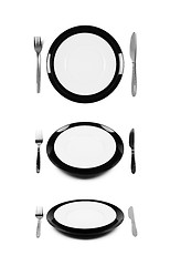 Image showing Two stacked black and white plates