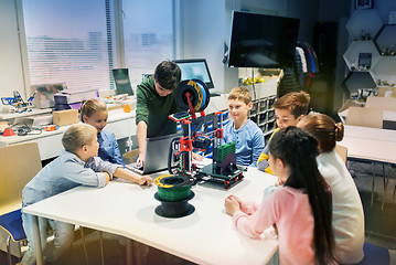 Image showing happy children with 3d printer at robotics school