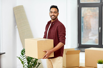 Image showing happy man with box moving to new home