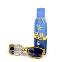 Image showing Sunscreen lotion and female sunglasses