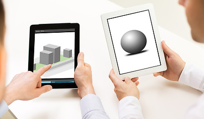 Image showing designers with 3d models on tablet pc screens