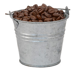 Image showing Dark roasted coffee beans in a metal bucket