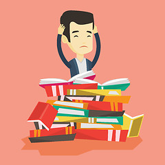 Image showing Student sitting in huge pile of books.