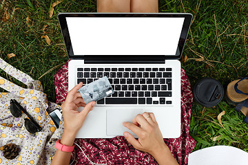 Image showing Anonymous woman shopping in Internet