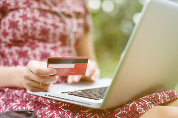 Image showing Anonymous woman shopping in Internet