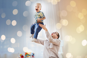 Image showing father with son playing and having fun at home