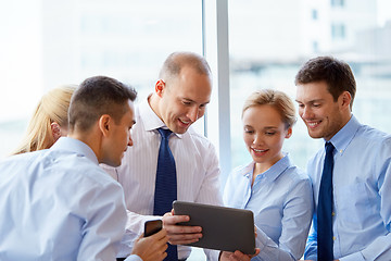 Image showing business people with tablet pc computer at office