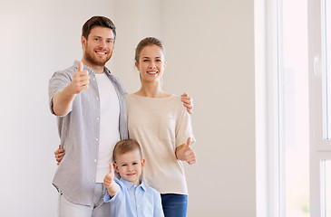 Image showing happy family with child moving to new home