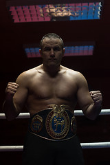 Image showing kick boxer with his championship belt