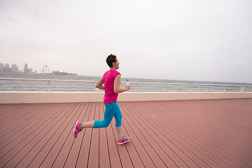 Image showing woman running on the promenade