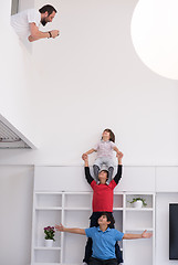 Image showing young boys posing line up piggyback