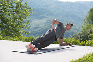 Image showing man doing morning yoga exercises