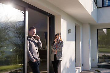 Image showing couple enjoying on the door of their luxury home villa