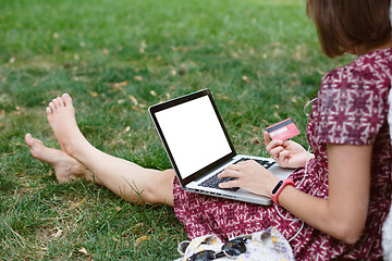 Image showing Anonymous woman shopping in Internet