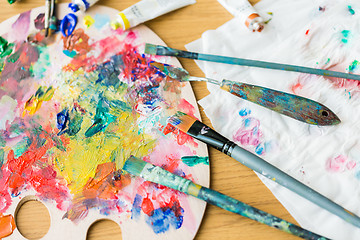 Image showing palette knives or painting spatulas and brushes