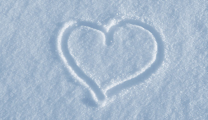 Image showing Draw of heart on the white snow 