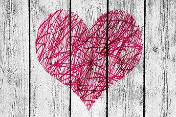 Image showing Abstract heart with messy pattern on old wooden wall