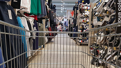 Image showing Shopping cart in clothing retail shop