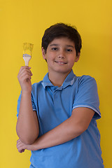 Image showing Portrait of a happy young boy painter