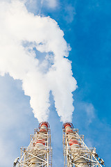 Image showing Stream of dark smoke from the chimney of factory