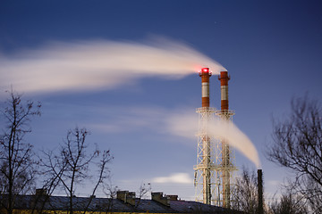 Image showing Stream of dark smoke from the chimney of factory