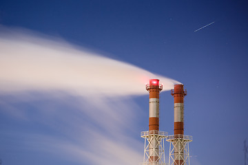 Image showing Stream of dark smoke from the chimney of factory