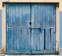 Image showing Old large wooden doors painted in blue