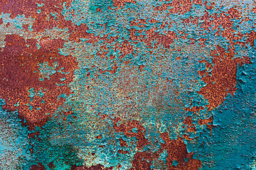 Image showing Rusty Colored Metal with cracked paint