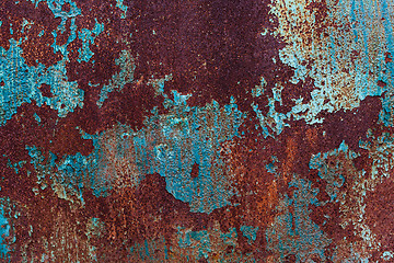 Image showing Rusty Colored Metal with cracked paint