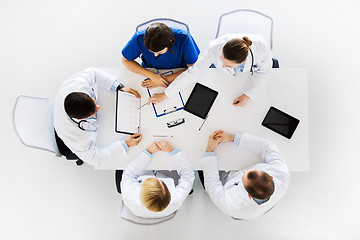 Image showing doctors with cardiograms and tablet pc at hospital