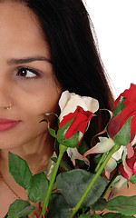 Image showing Halve of a face of a woman with roses