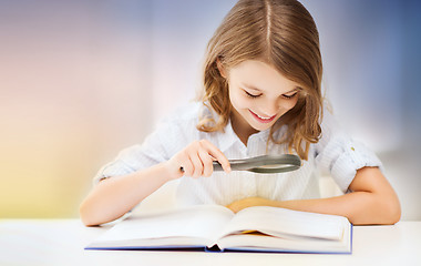 Image showing happy smiling student girl reading book