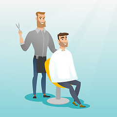 Image showing Barber making haircut to young man.