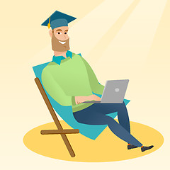 Image showing Graduate sitting in chaise lounge with laptop.