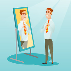 Image showing Business man looking himself in the mirror.